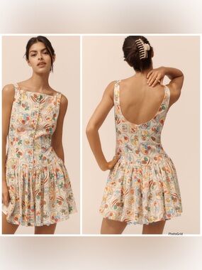 En Saison Nayeli Sleeveless
Mini Dress